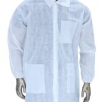 Disposable white lab coat with long sleeves, front buttons, and multiple pockets, worn over dark clothing.