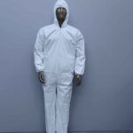 Front view of white disposable PPE coverall suit with hood and boot covers for protective safety wear.