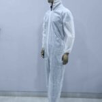 Full-body disposable PPE coverall with hood and boot covers for medical and industrial safety use.