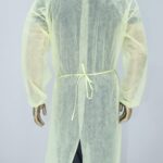 Back view of yellow disposable isolation gown with waist tie closure for medical use