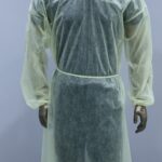 Front view of disposable yellow isolation gown for medical and hospital use