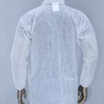 Back view of a mannequin wearing a disposable white lab coat or isolation gown with long sleeves, made from non-woven fabric.